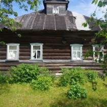 Бревенчатый дом в тихой деревне, недалеко от Рыбинского водо, в Москве