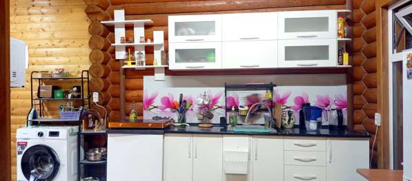 Деревянный коттедж из сруба в ЦО Радуга West в фото 4