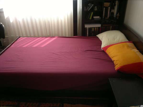 Кровать с подъемным механизмом