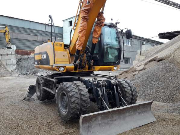 Колесный экскаватор JCB JS160W, 2010 г. в в фото 12