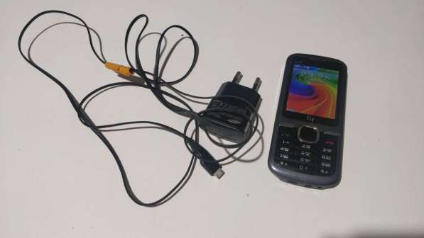Мобильный телефон Fly DS123 (черно-серый) в 