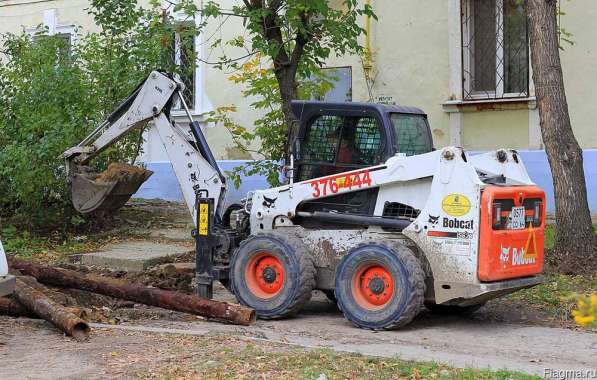 Аренда мини-погрузчика Bobcat с навесным экскаватором