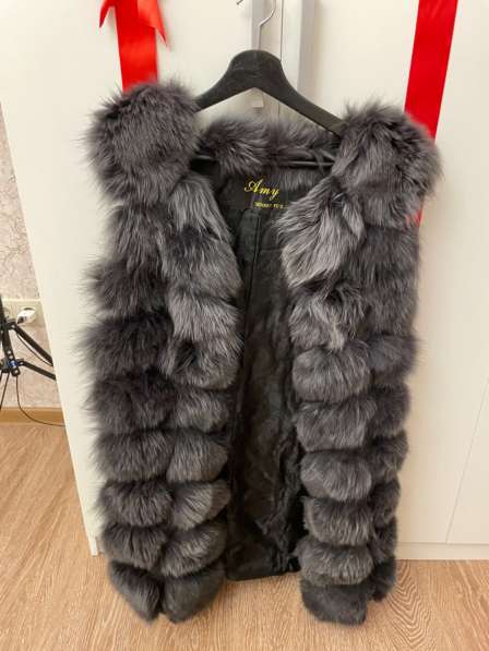 Меховая жилетка